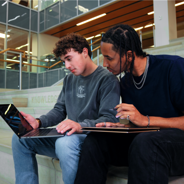 students looking at a phone